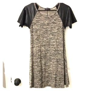 Dress with leather sleeves